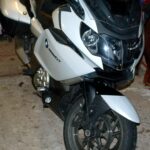 BMW motorbike stored securely in Bryn Bella's garage, Betws-y-Coed